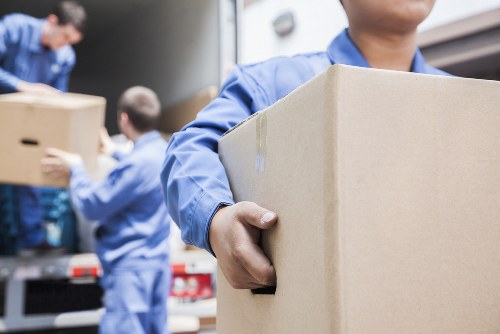 Removal team sorting recyclable items in Chiswick during a move