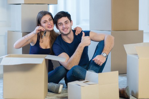 Moving team preparing a Chiswick home move with packed boxes and furniture