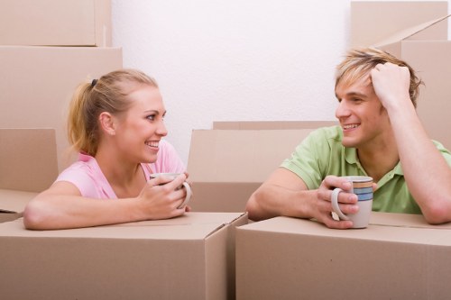 Office removals planning in Chiswick with moving boxes and workspace setup