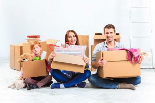 Student removals moving boxes in Chiswick residential street
