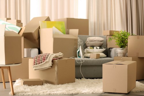 Careful loading of furniture into a moving vehicle in Chiswick