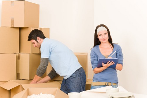Preparing furniture for safe removals in Chiswick with protective wrapping