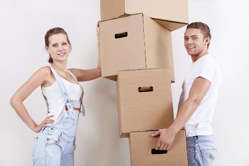 Unpacking boxes and setting up rooms after a move in Chiswick