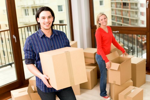Moving boxes and household items being transported from a Chiswick property